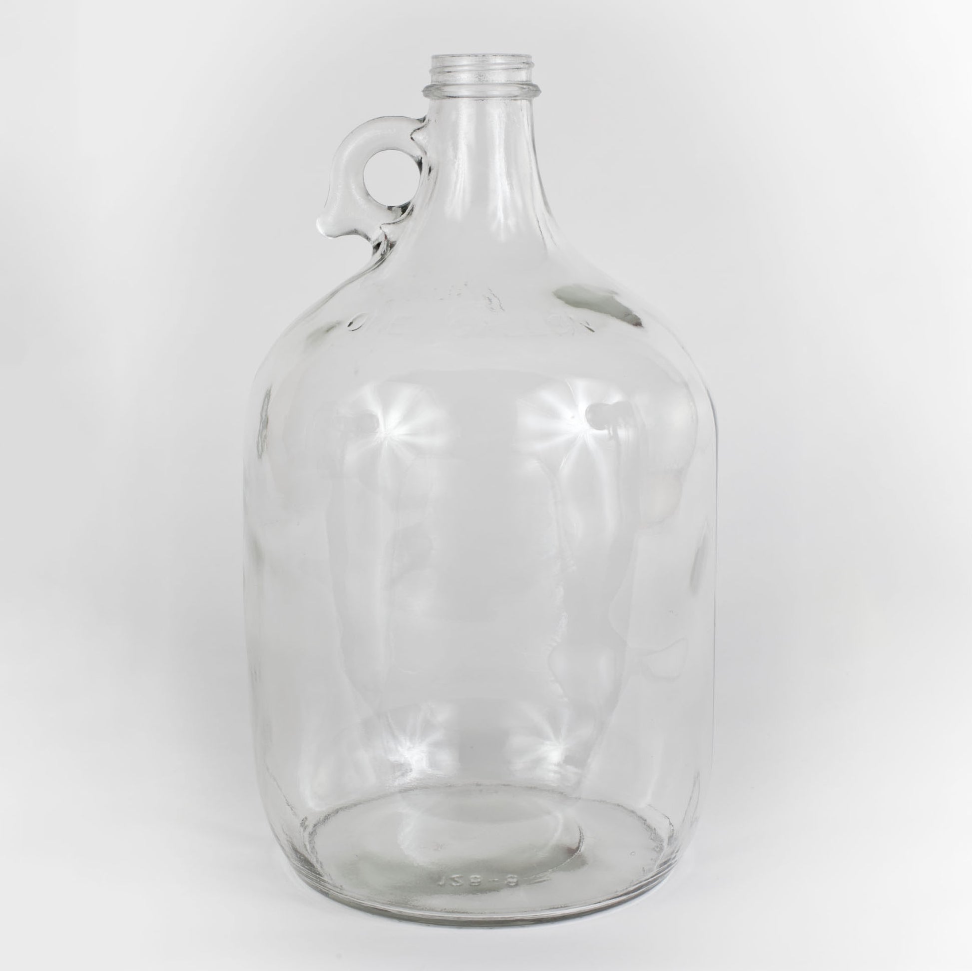 Clear one gallon glass jug