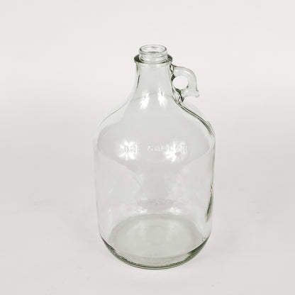 Clear one gallon glass jug