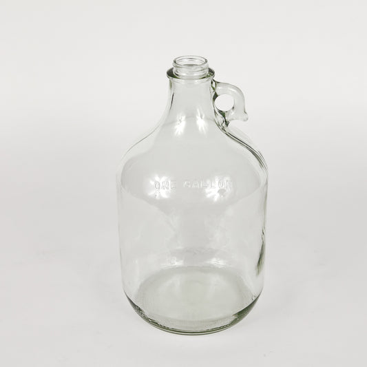 Clear one gallon glass jug